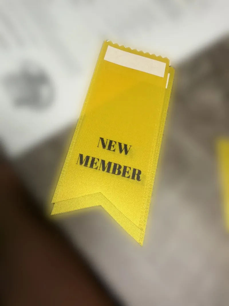 Yellow new-member ribbons.